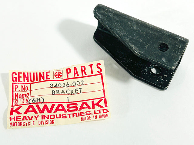 34036-002 NOS Kawasaki KZ650 Footrest Bracket Rear Passenger