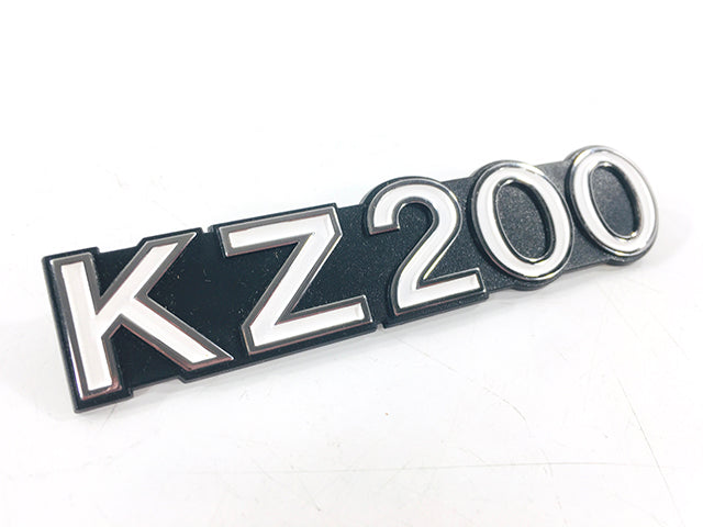 56018-1070 NOS Kawasaki KZ200 Side Cover Emblem