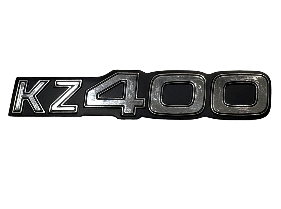 NOS 56018-255 Kawasaki KZ400 Side Cover Emblem